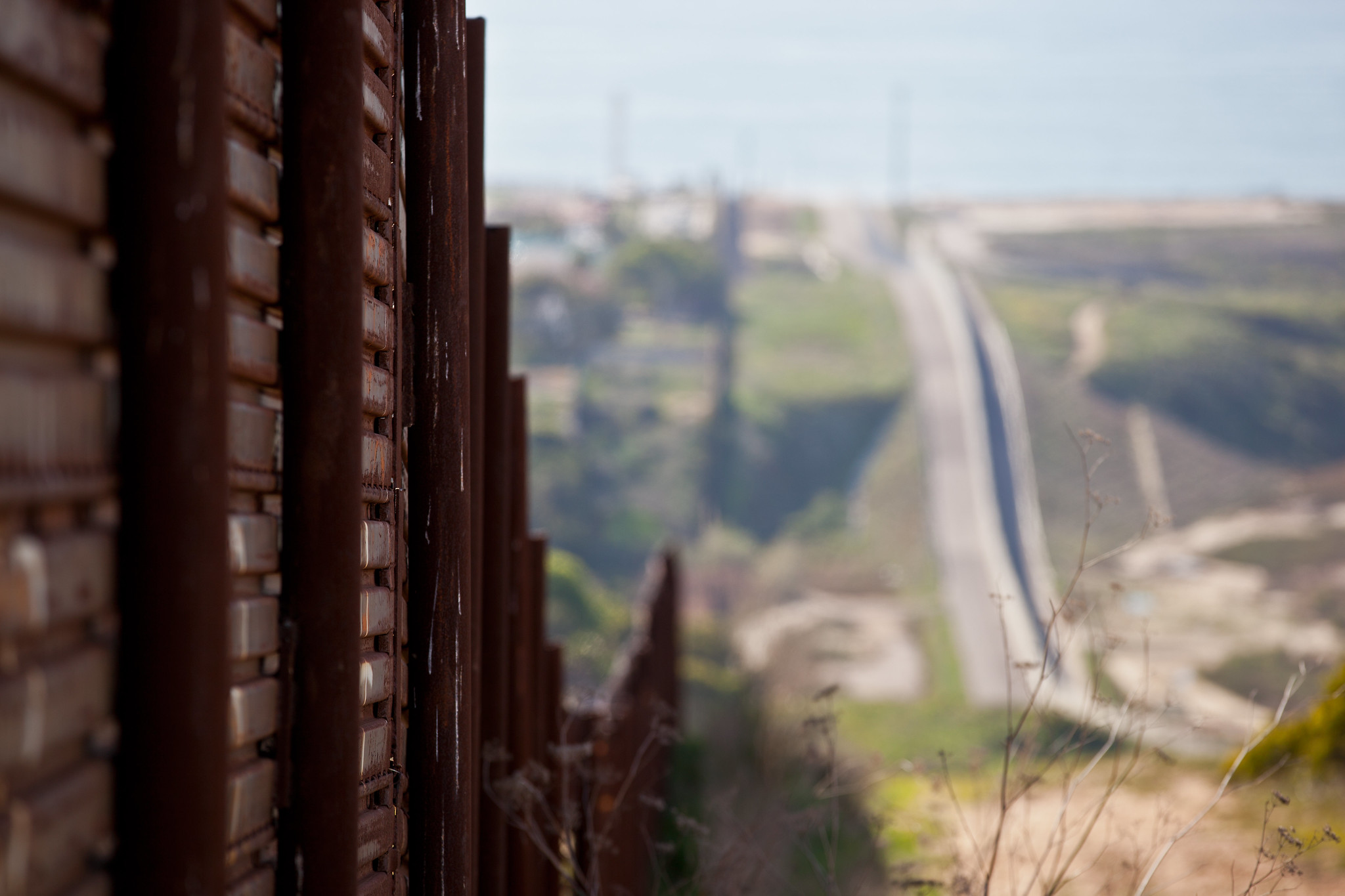 
            A close-up view of the fence along the U.S. border